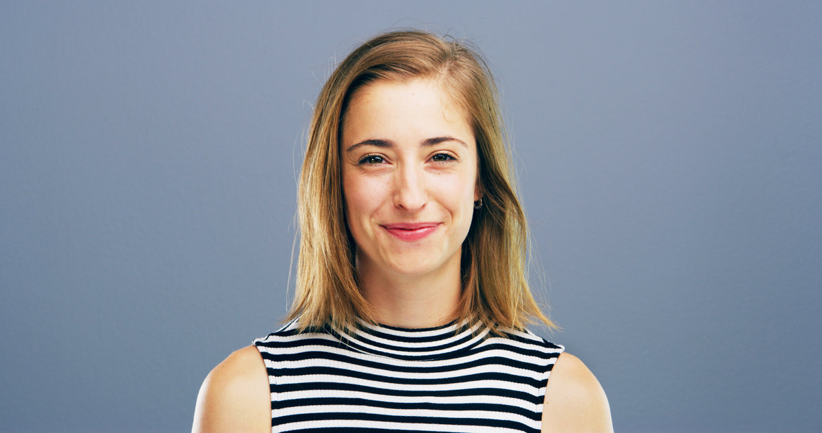 Professional, happy and portrait of woman in studio for staff ID, company card and about us. Business, mockup space and face of isolated person for career, job or employee profile on blue background.
